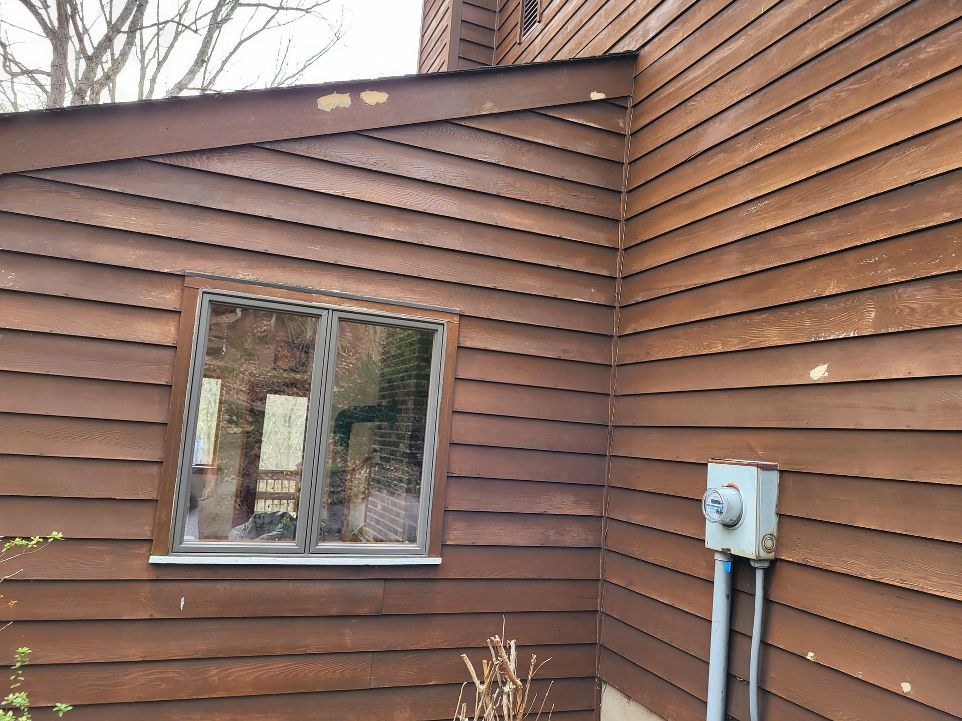 power wash and re-stain house