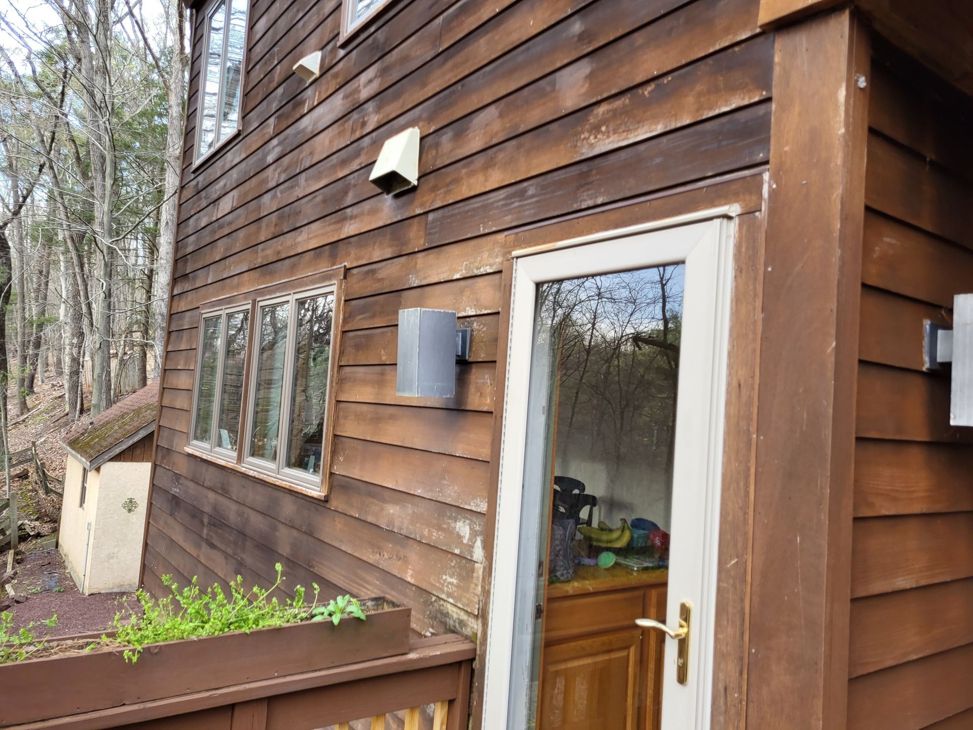 power wash and re-stain house