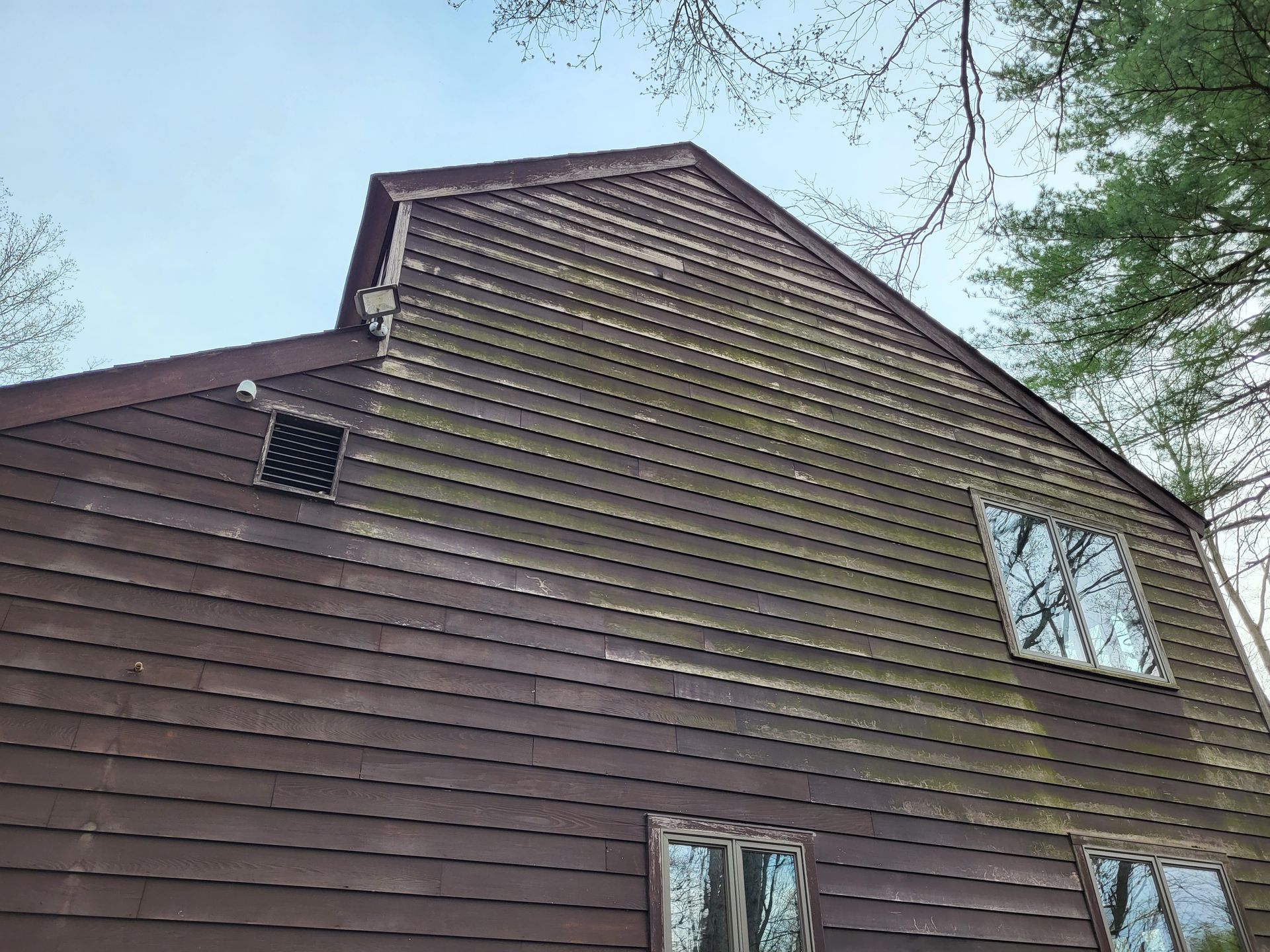 power wash and re-stain house