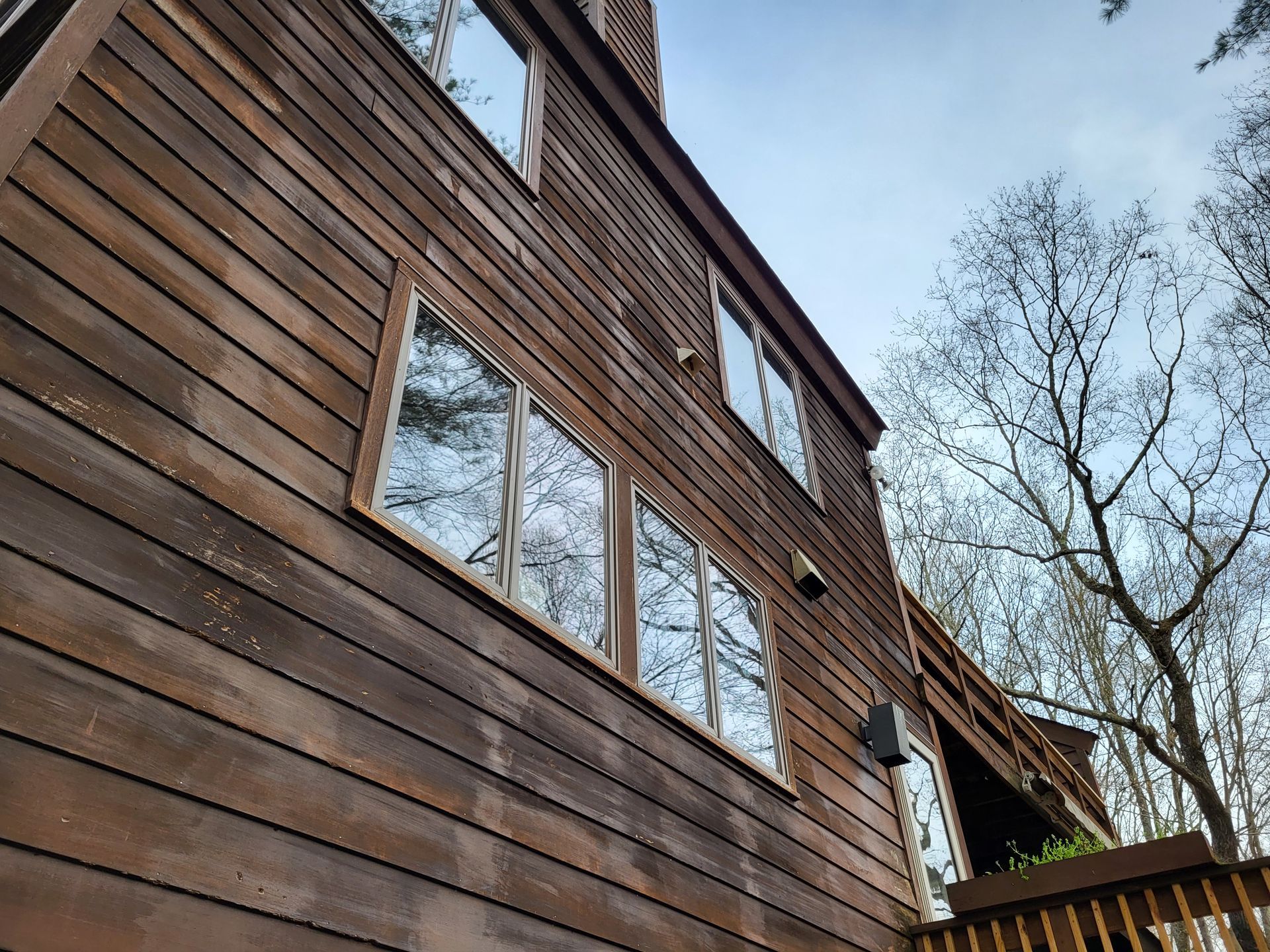 power wash and re-stain house