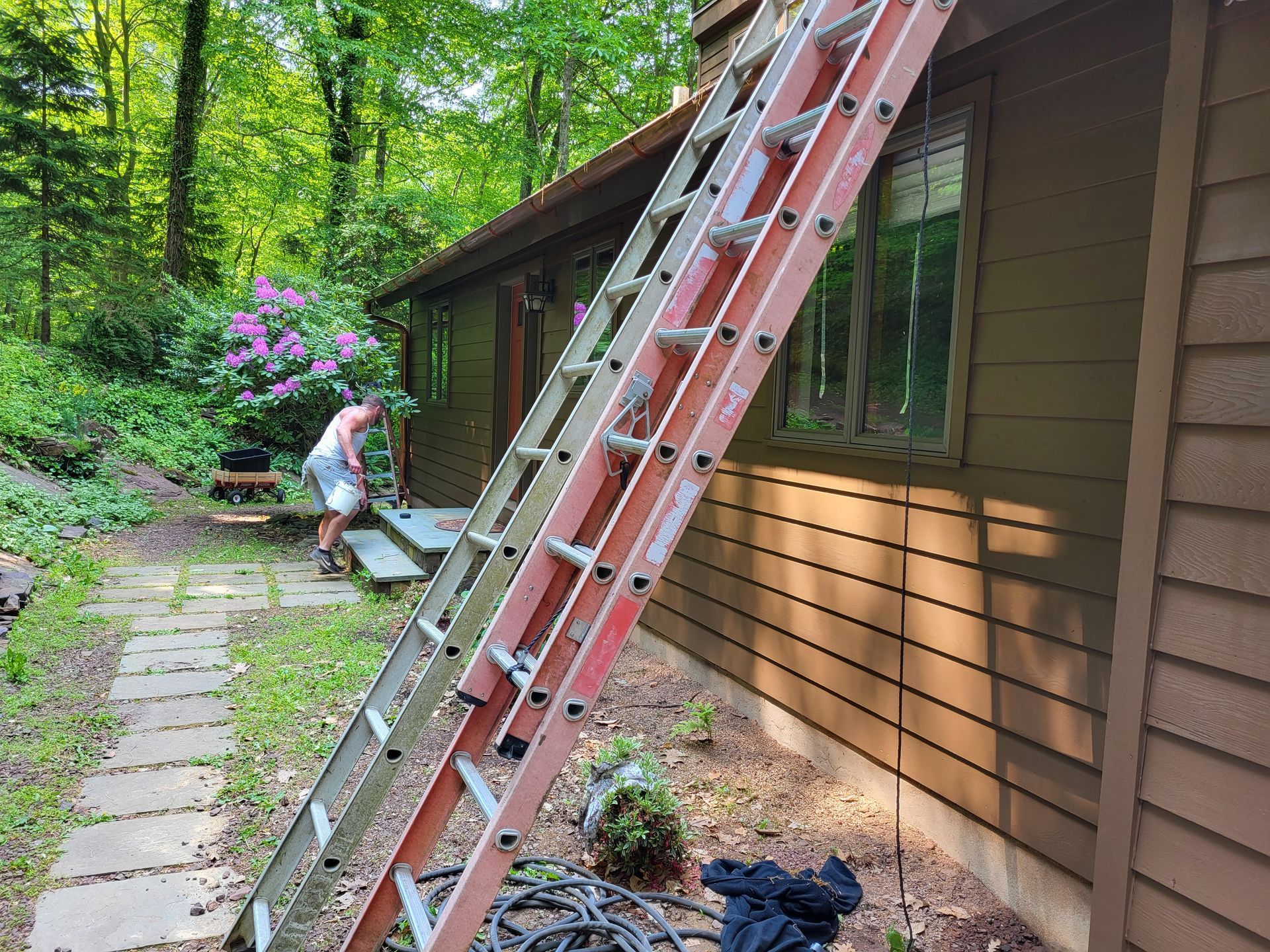 power wash and re-stain house