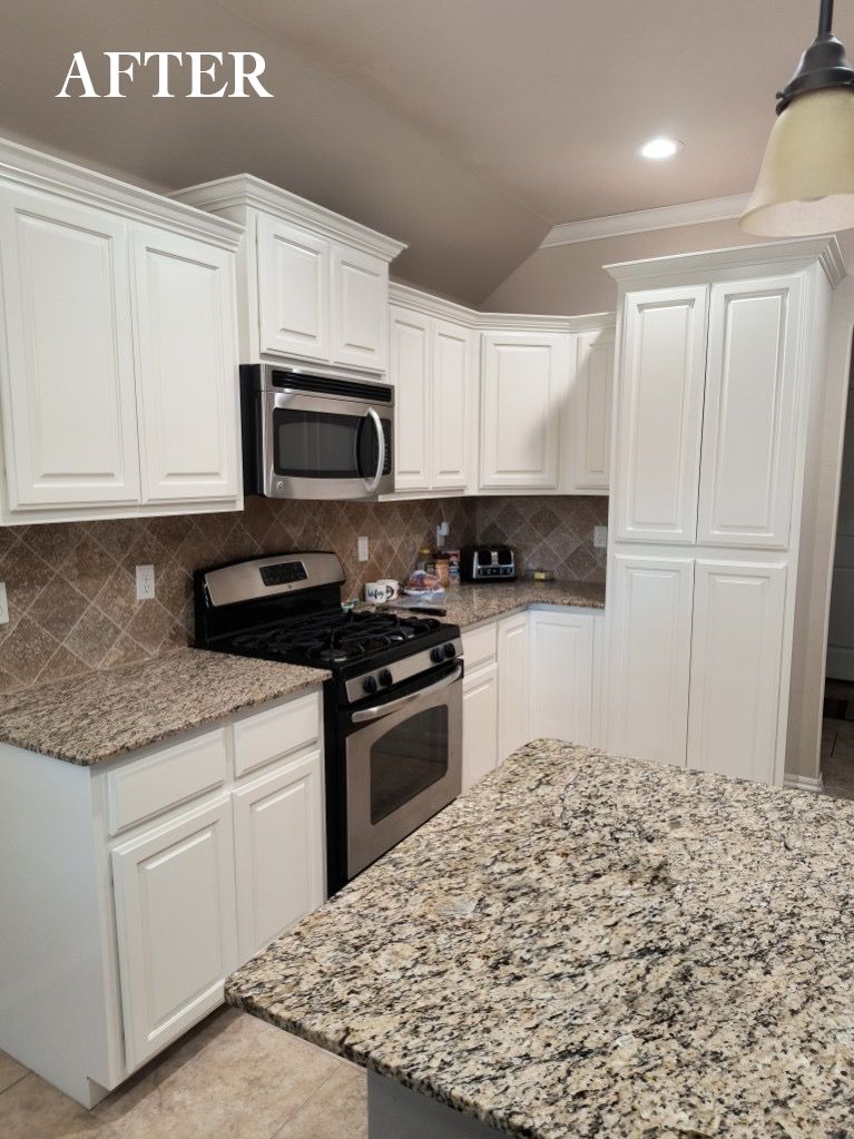 After photo of a white kitchen with granite counters, stainless stove, microwave, and tiled backsplash