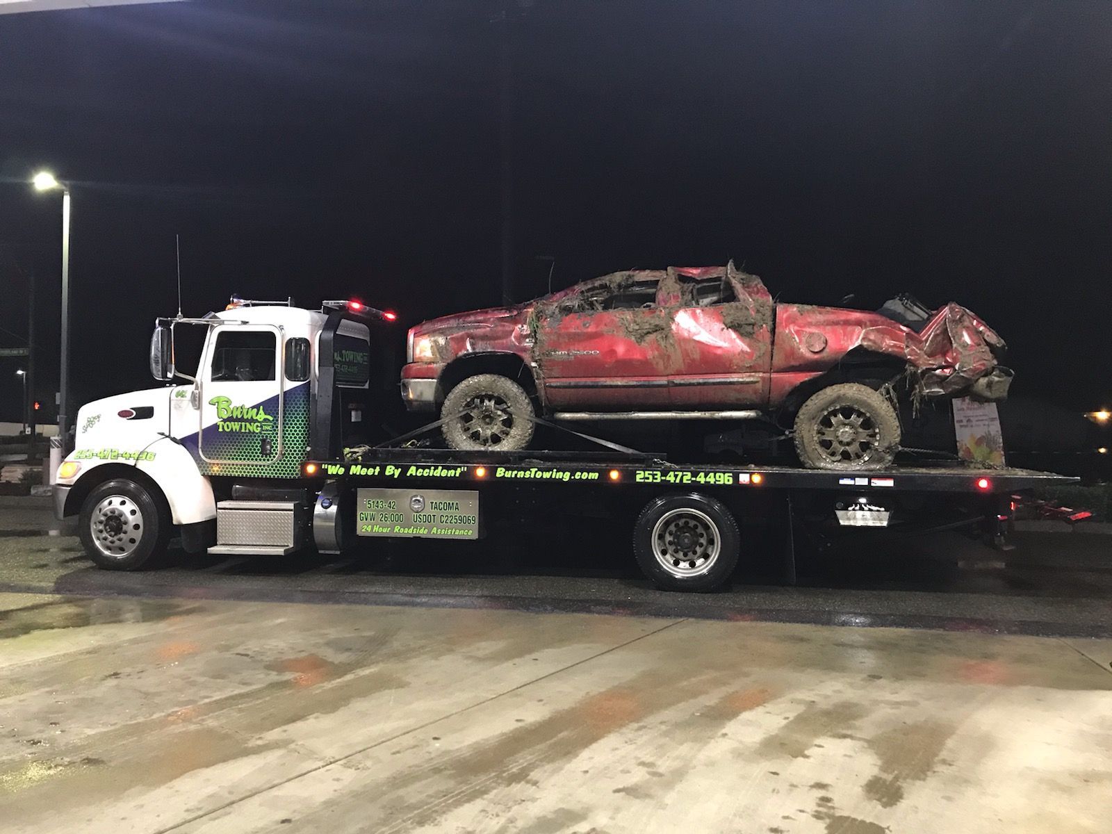 Wrecked car on a tow truck