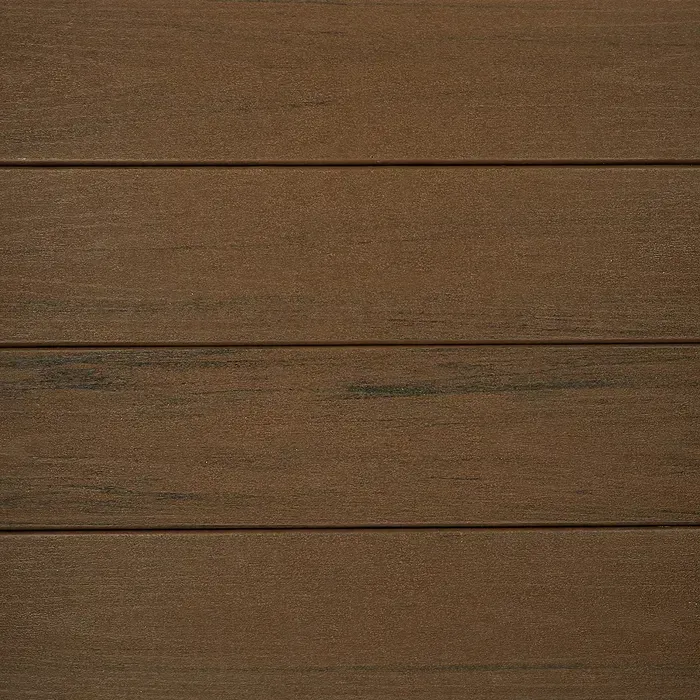 Close-up of brown composite decking boards, horizontally aligned with narrow gaps between each.