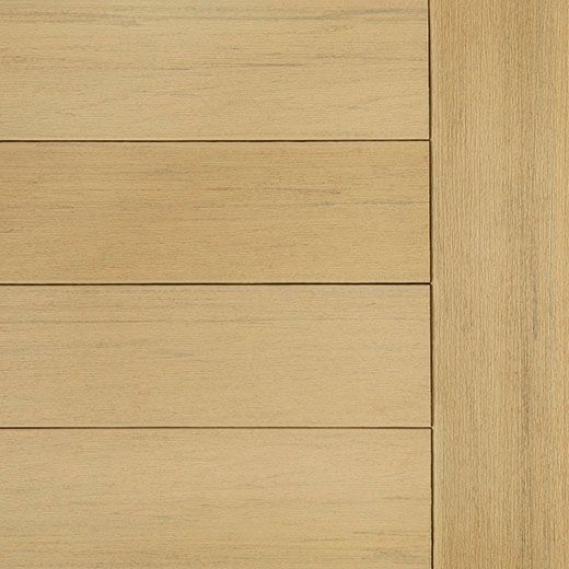 Wooden door, light brown planks on left, vertical wood panel on right.