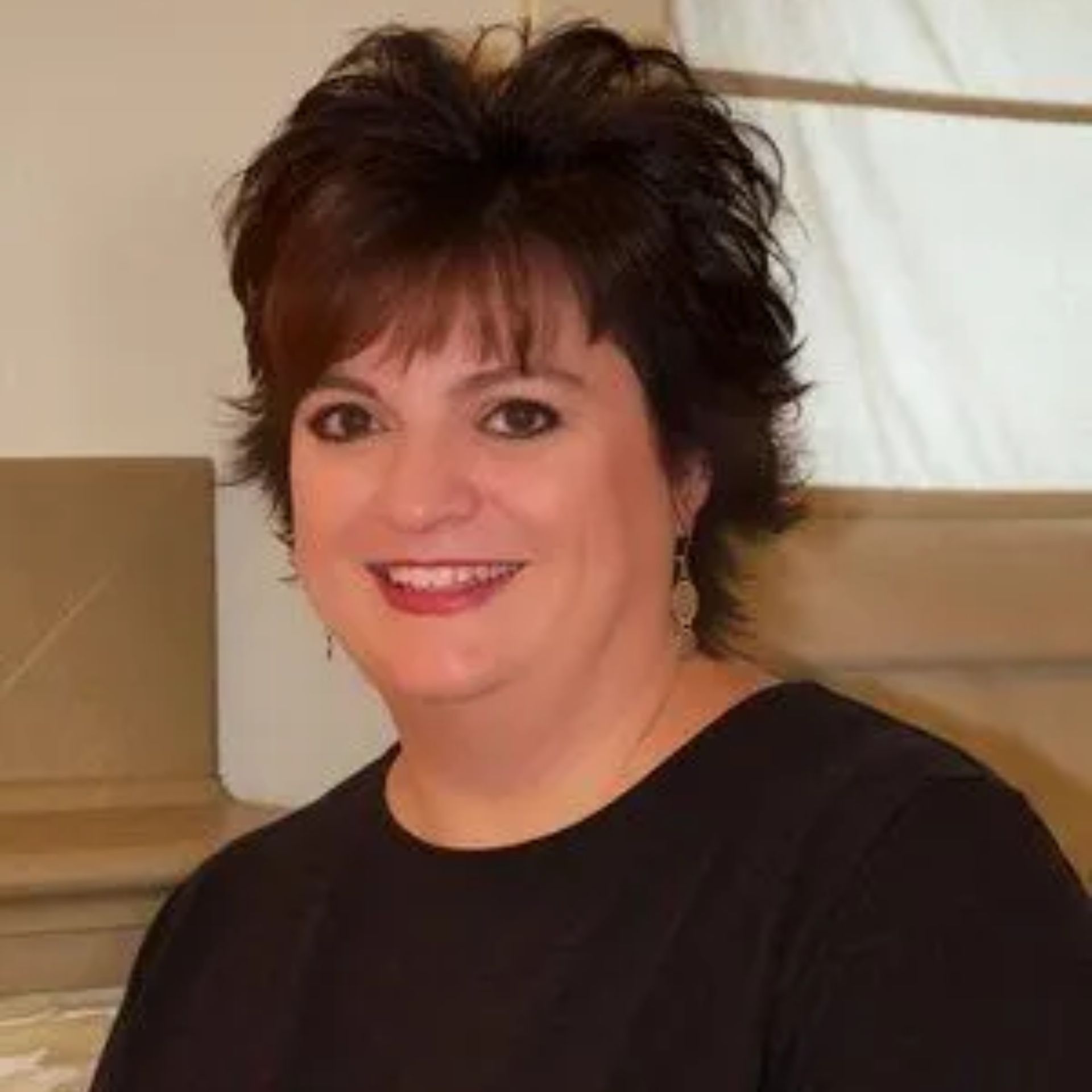 Photo of {{Team Member Name}}