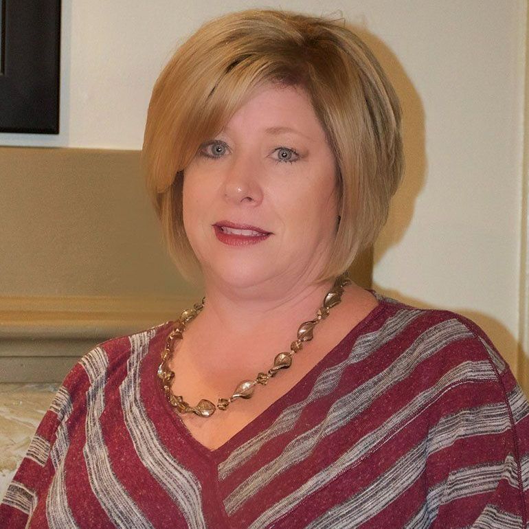 Photo of {{Team Member Name}}