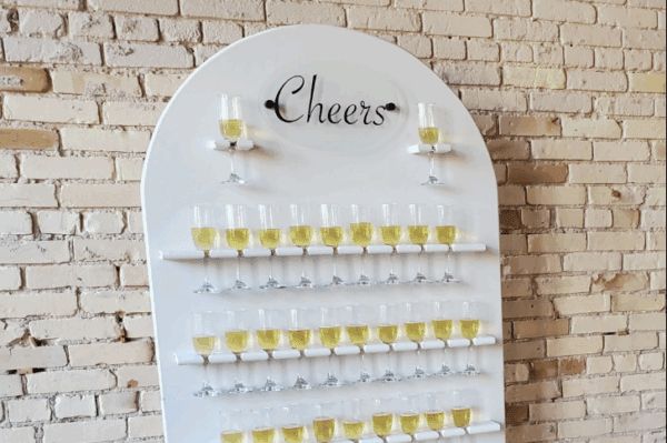White wall-mounted drink display with 