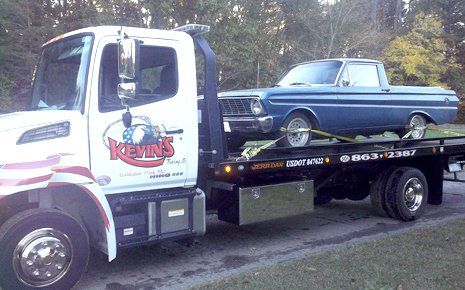 Towing truck with car