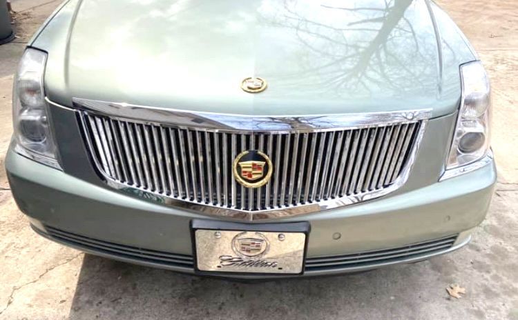Front Cadillac bumper grille before