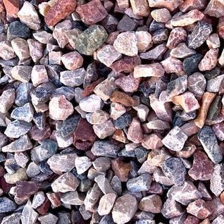 A pile of rocks of different colors and sizes.