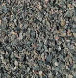 A pile of gravel is sitting on the ground.