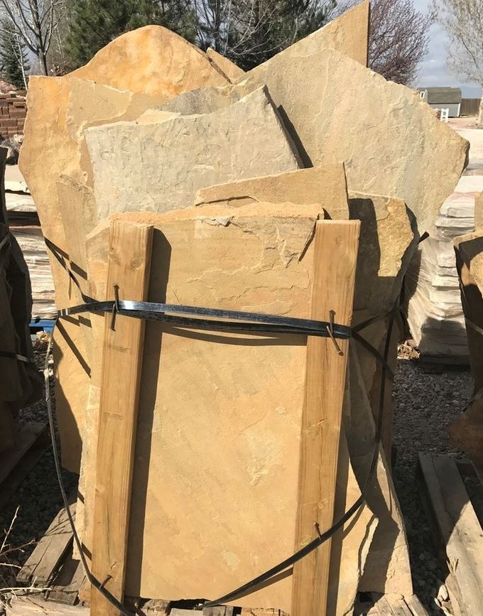 A pile of rocks sitting on top of a wooden pallet.