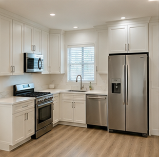 Bright white modern kitchen with stainless steel appliances, window over sink, and light wood floor
