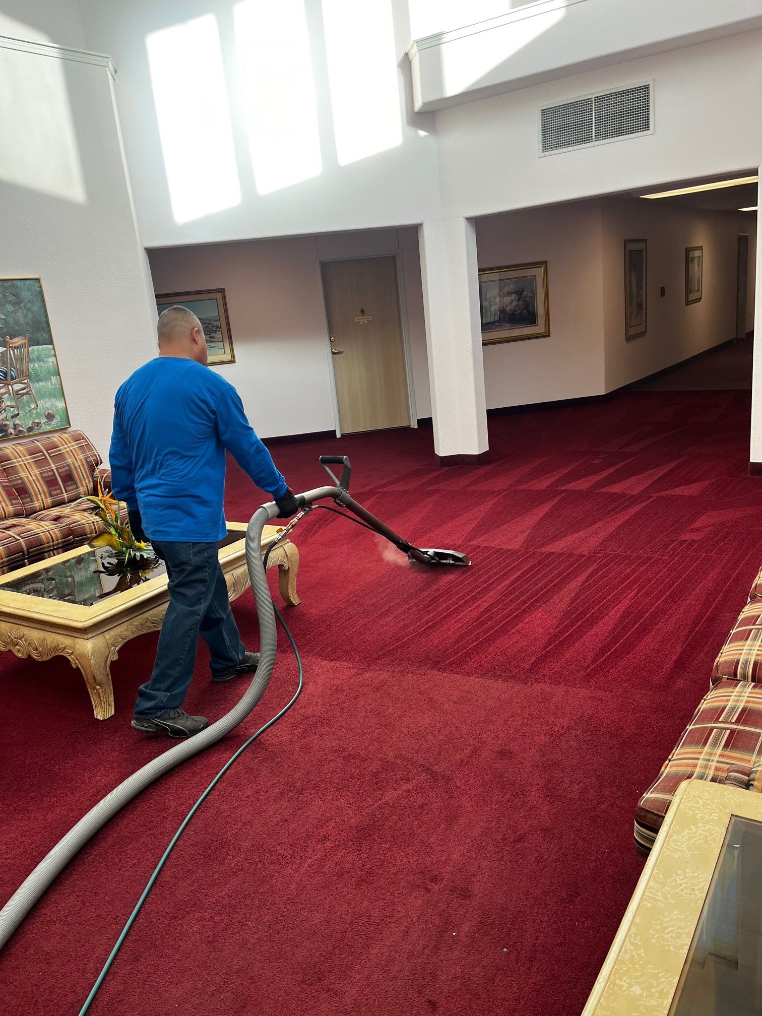crew cleaning the commercial carpet