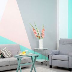 A living room with a freshly painted wall