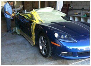 painting a blue convertible car