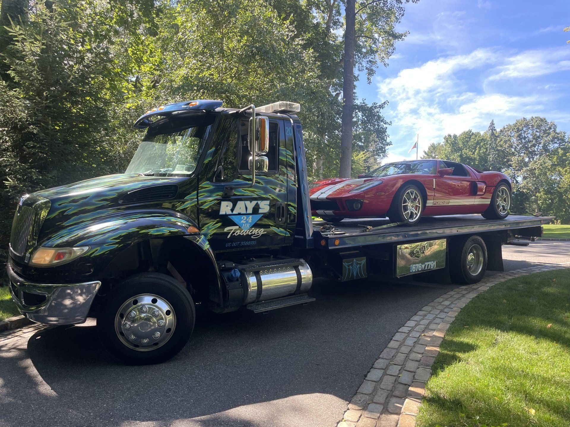 Flatbed Red Car Towing