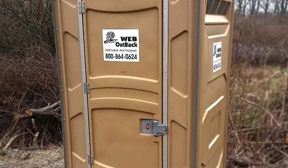 Tan portable toilet with 
