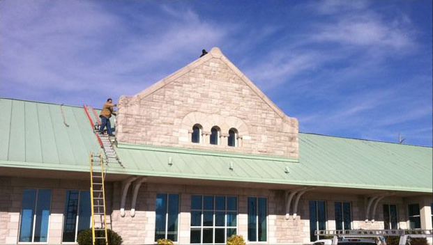 Man inspecting roof