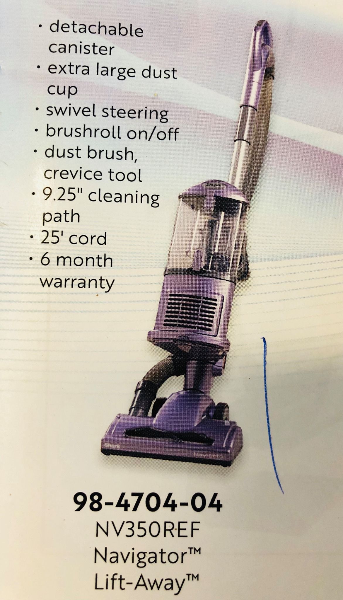 A purple vacuum cleaner