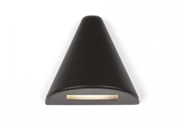 Dark brown, triangular outdoor wall light with rectangular light opening at the base.