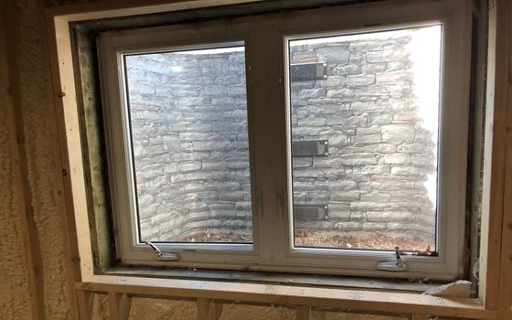 Basement egress window installation