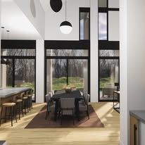 A dining room with a table and chairs and a lot of windows.