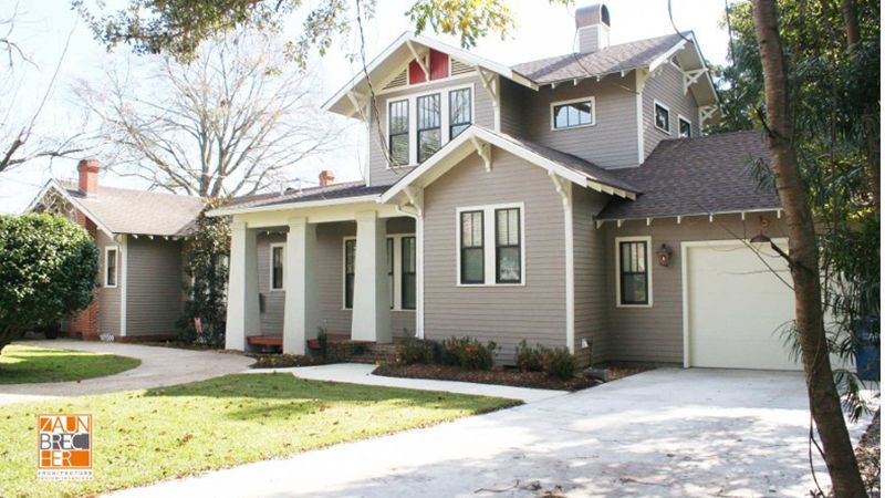 A large house with a white garage door