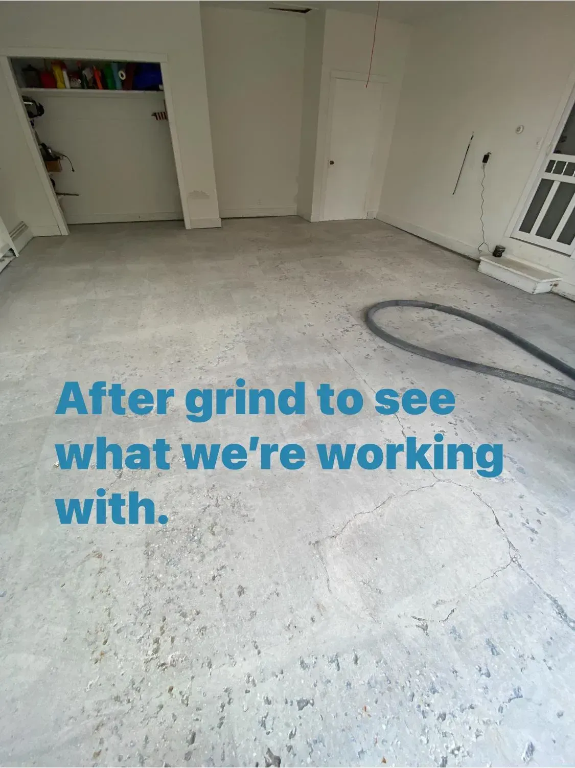 Grinded concrete floor in a room, revealing its surface. Text says, 