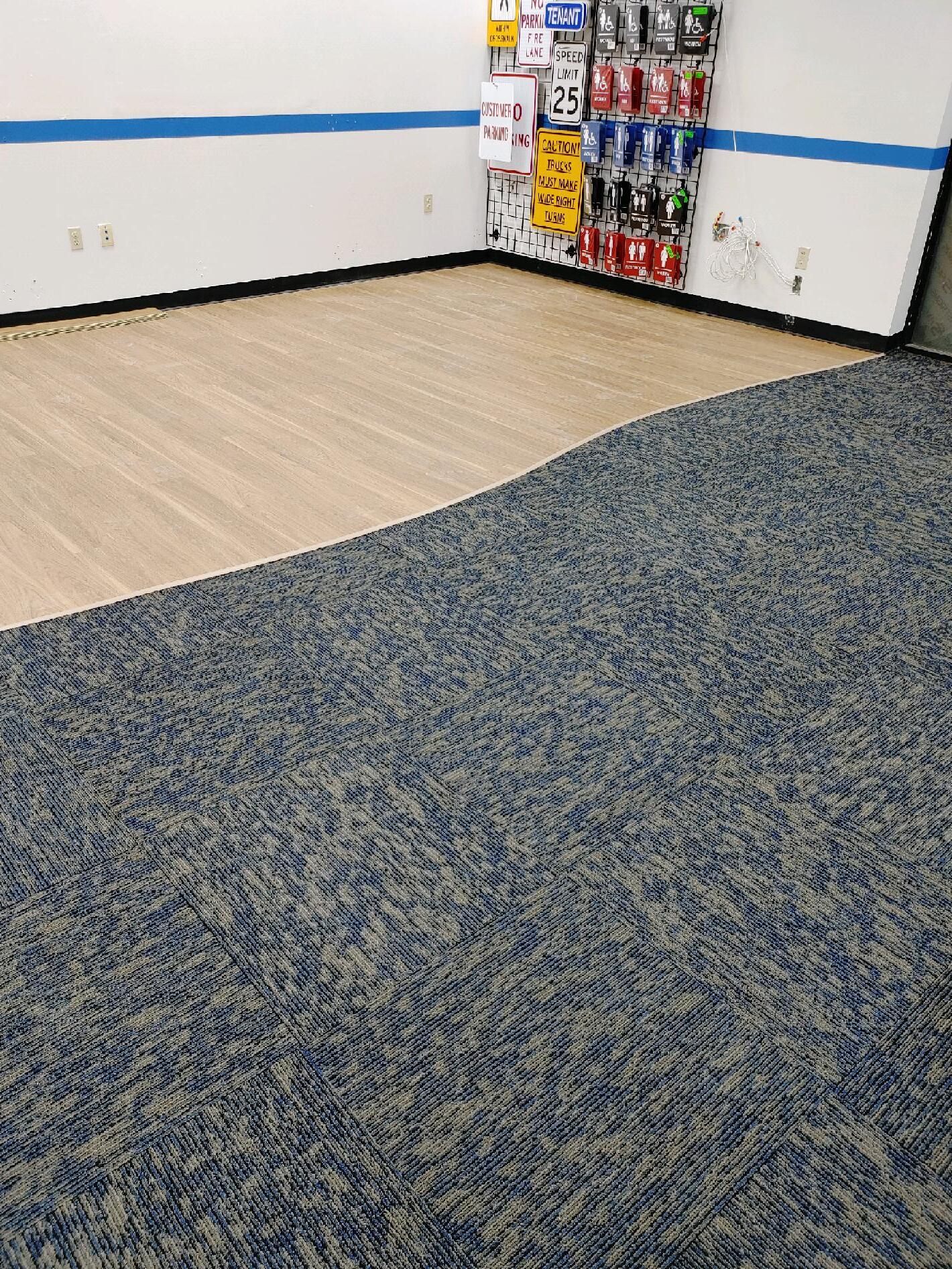 Carpet tile with waterproof laminate