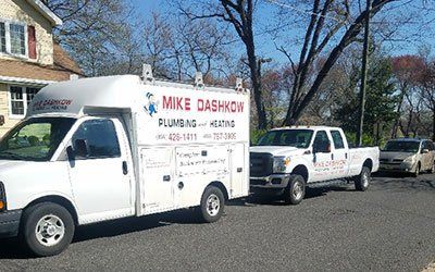 Mike Dashkow Plumbing & Heating service trucks