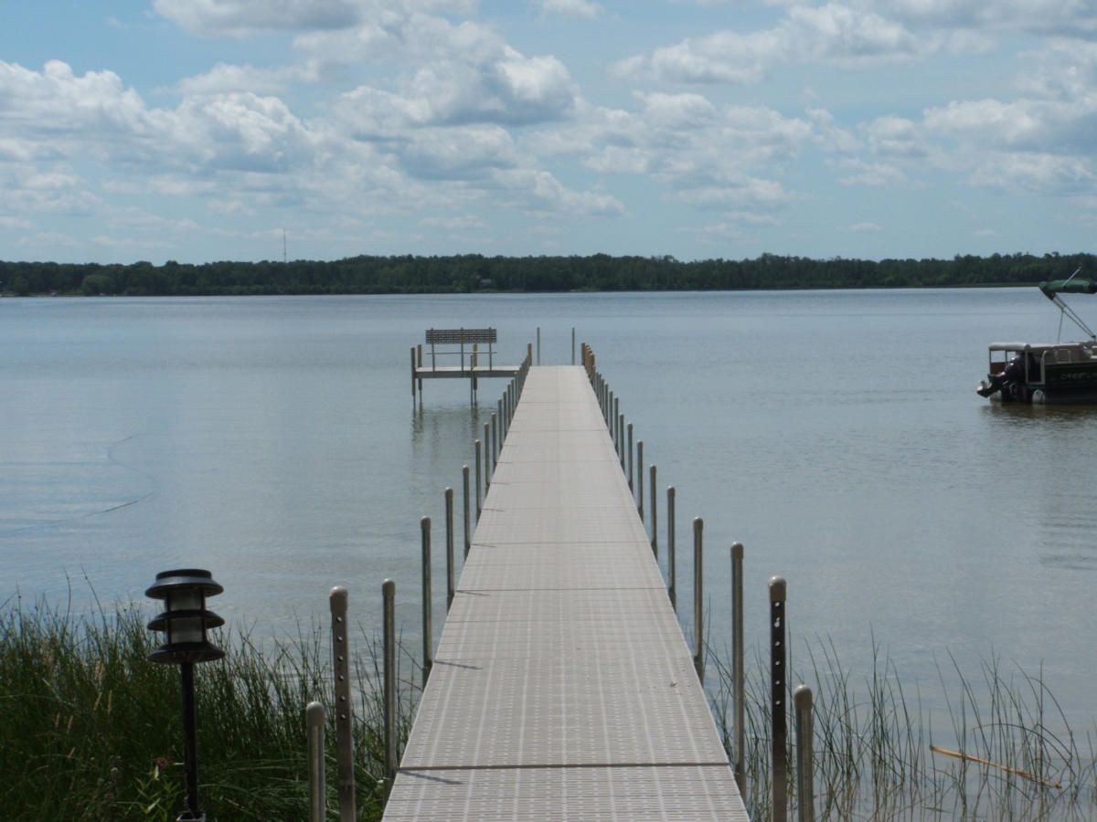 A dock leading into a large body of water