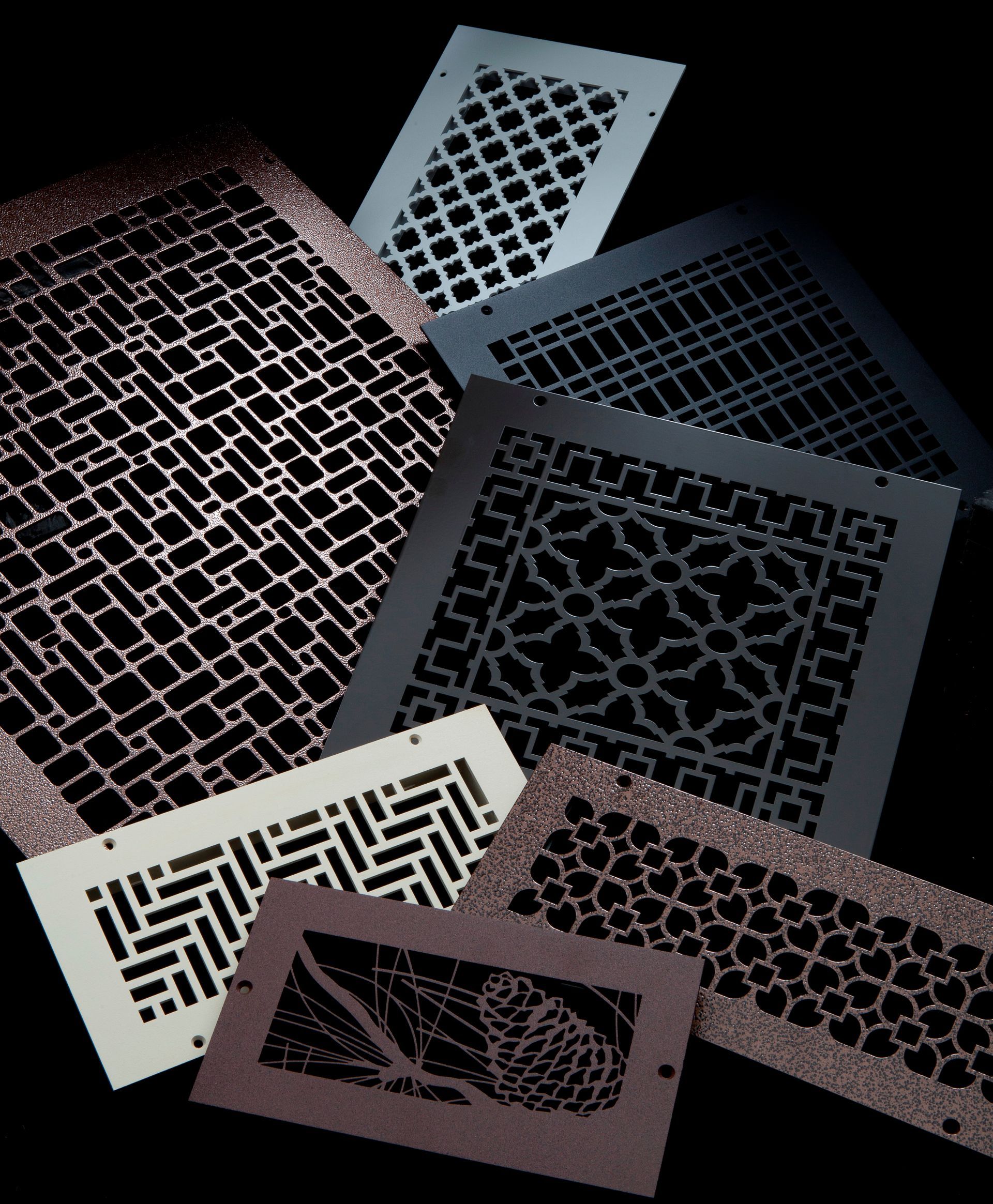 A bunch of different types of vent covers on a black background