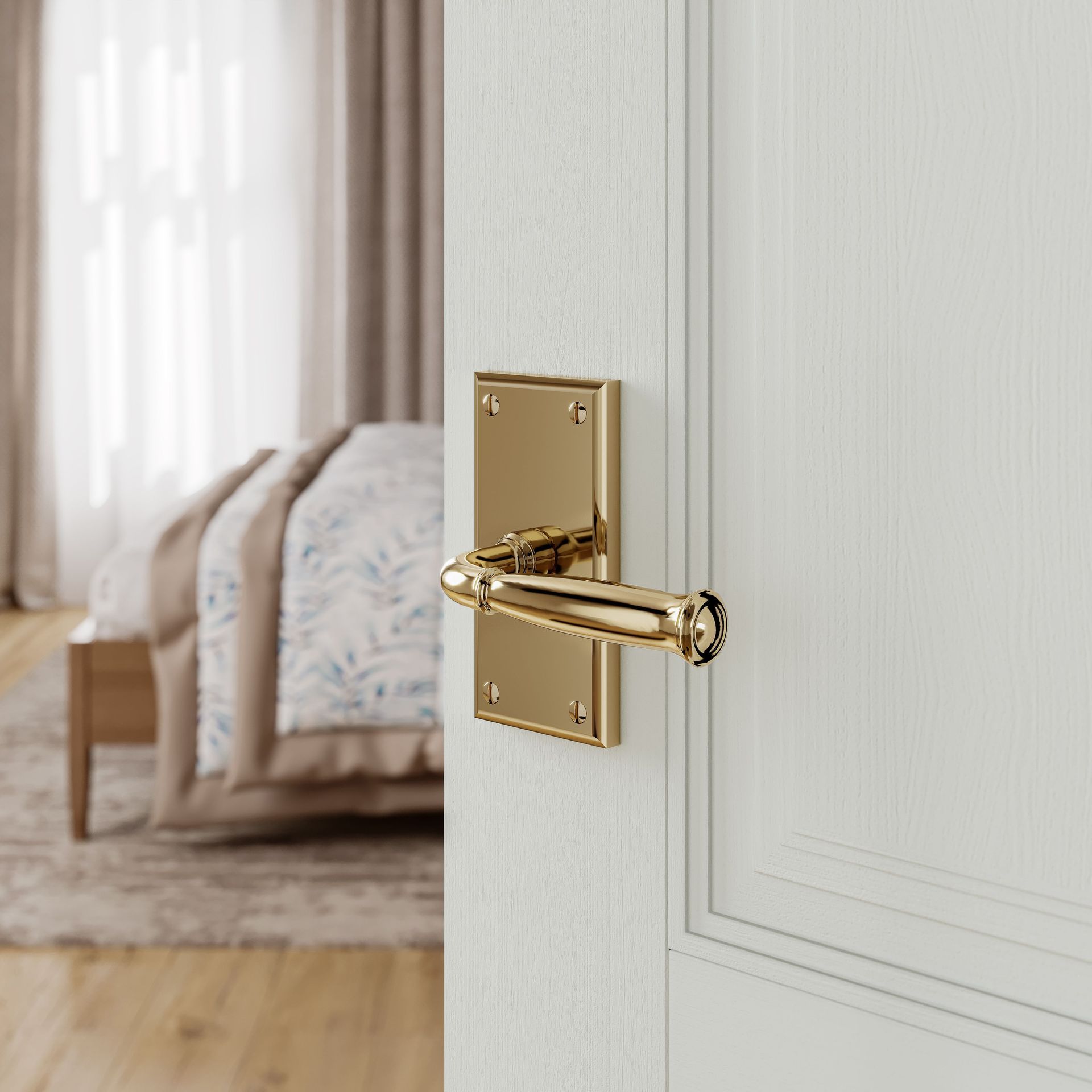 A close up of a door handle on a white door in a bedroom.