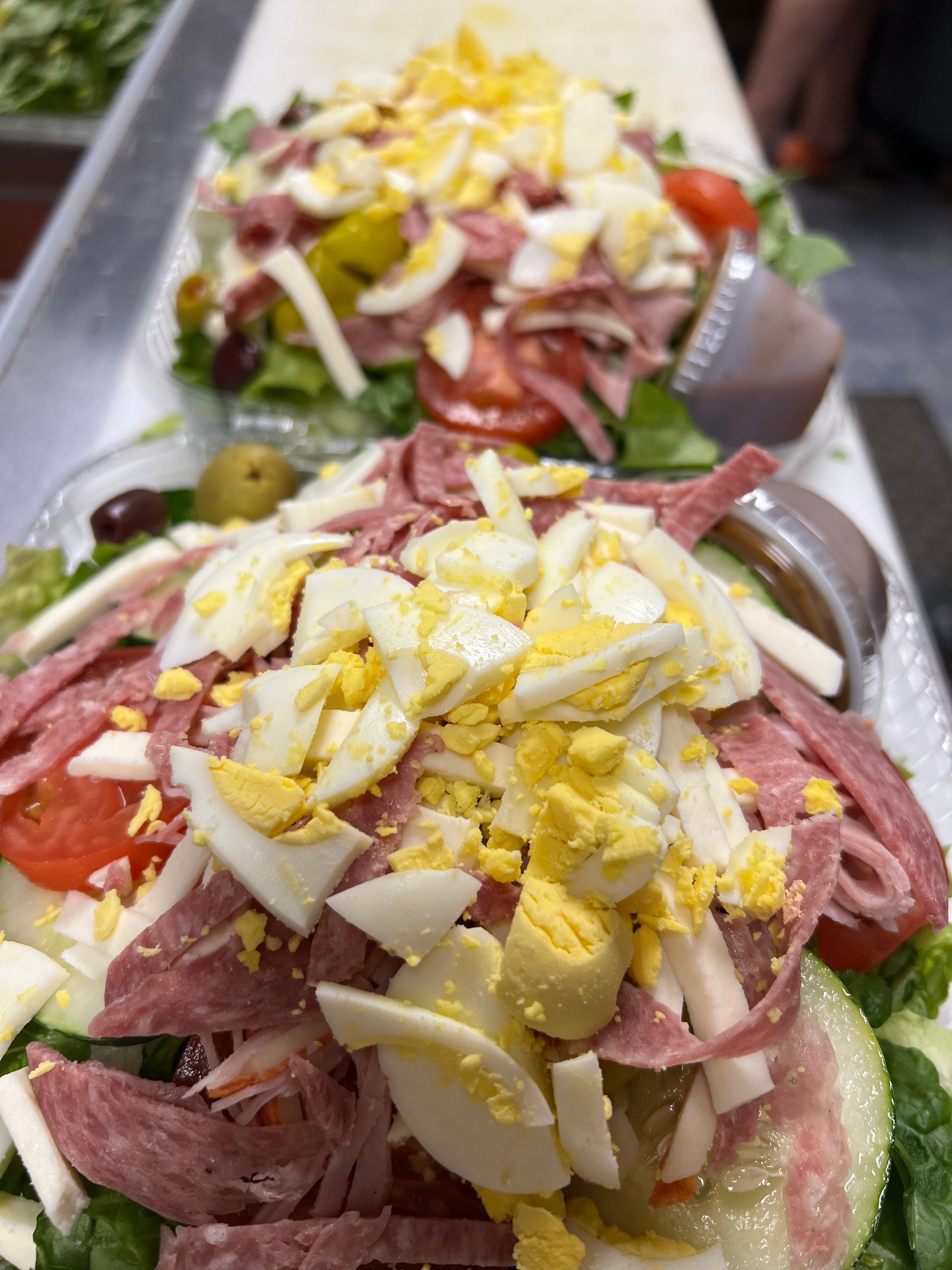 Salad with egg topping