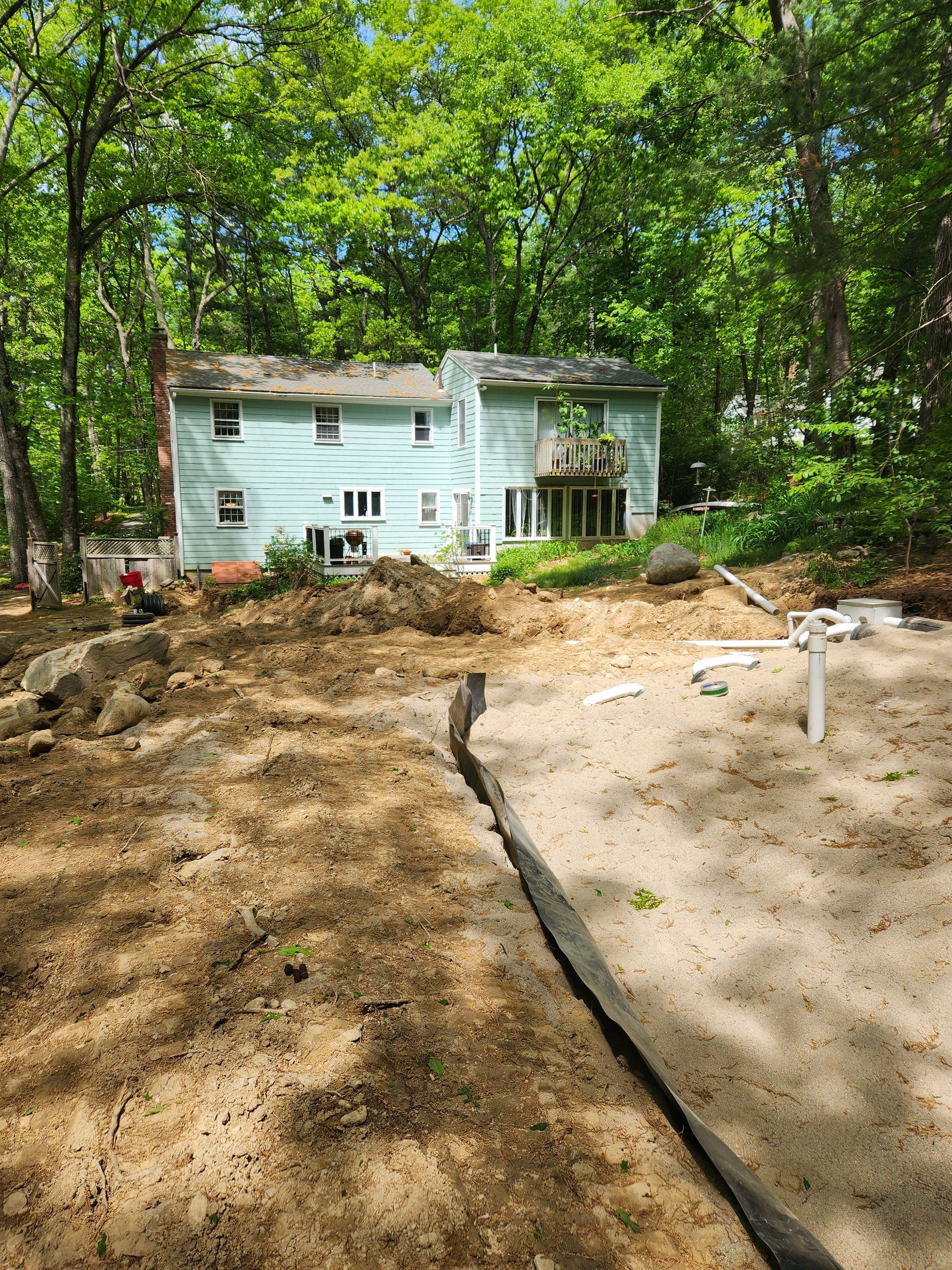 a house is being built in the middle of a forest