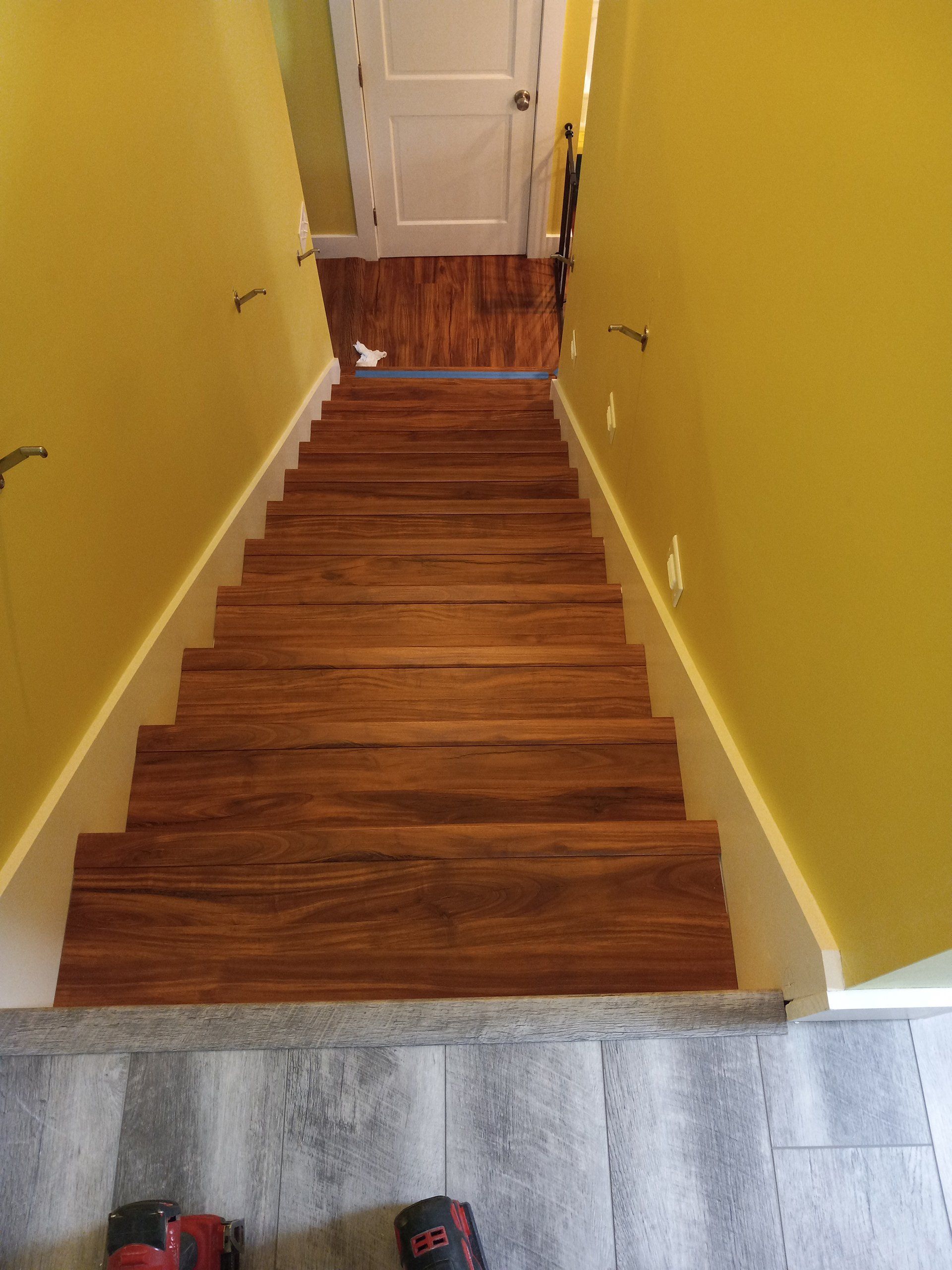 Stairs with yellow walls
