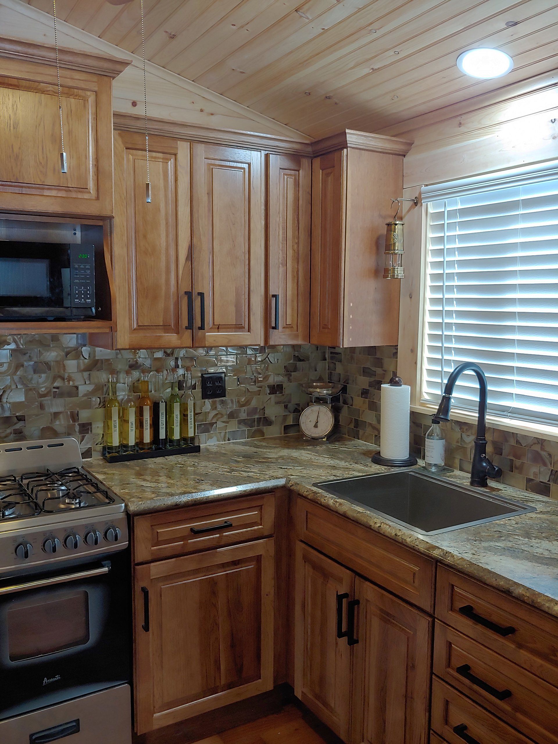 Kitchen with tiled walls