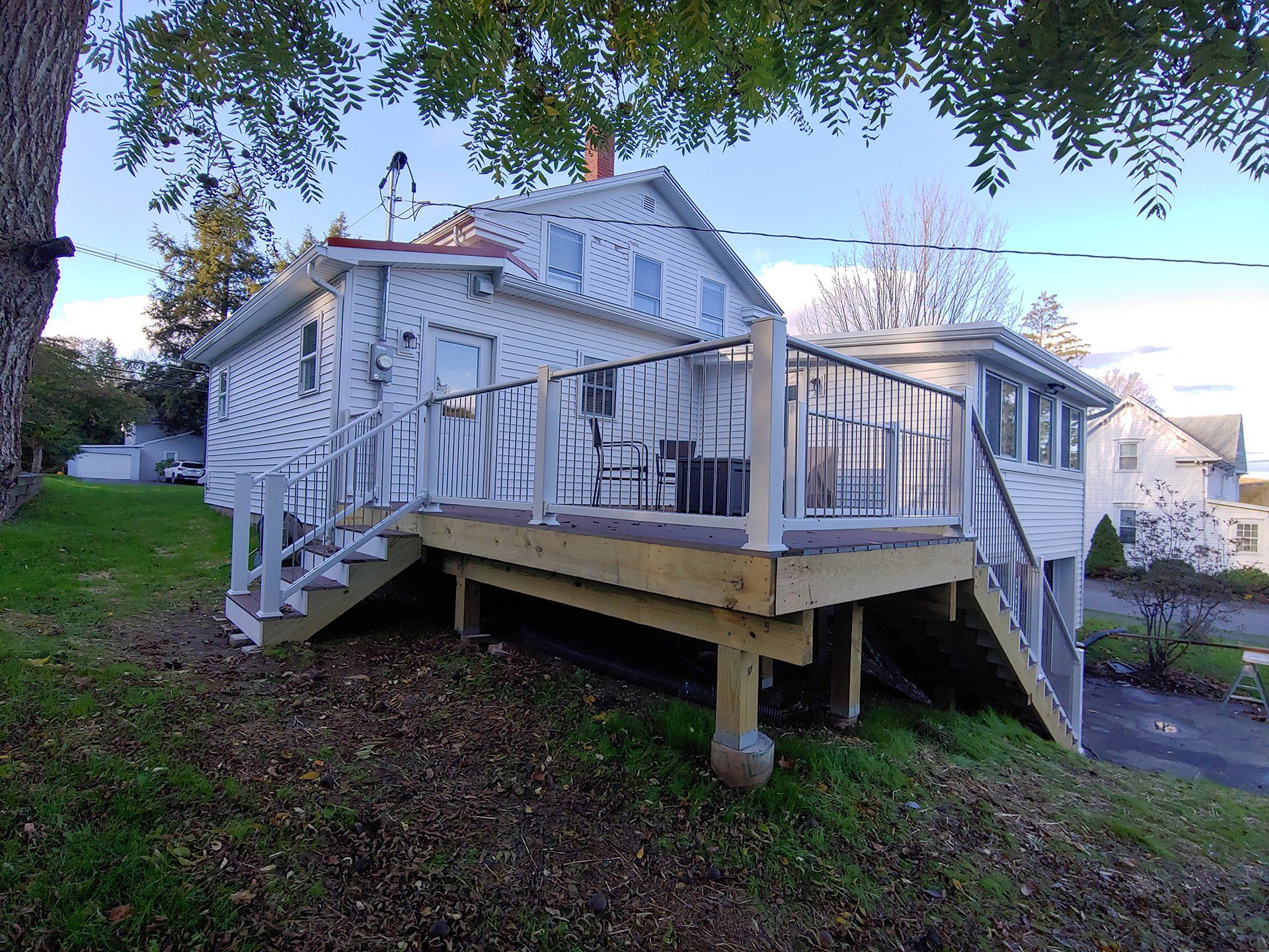 White house with beautiful deck