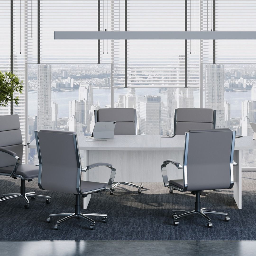 Modern office meeting room with white table, gray chairs, and large window overlooking city.