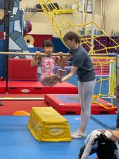 instructor coaching the kid