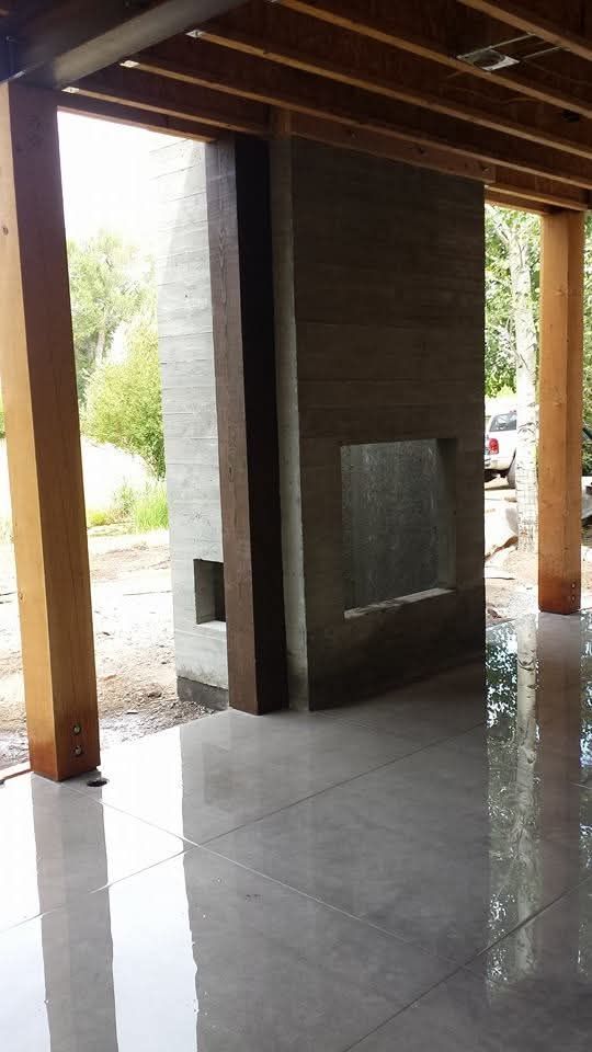 There is a fireplace in the middle of the room.
