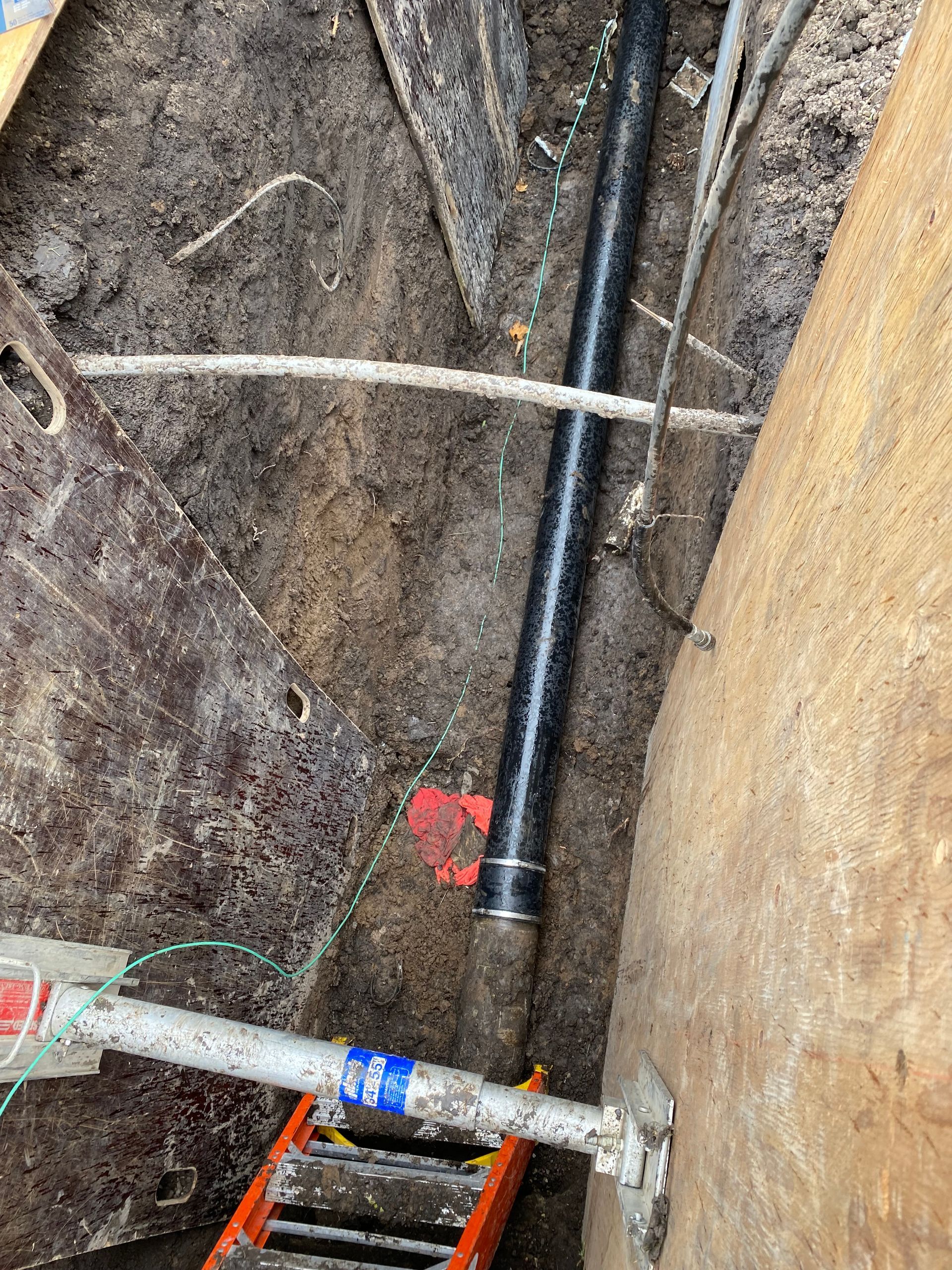 An excavation was made for the purpose of replacing the sewer system.