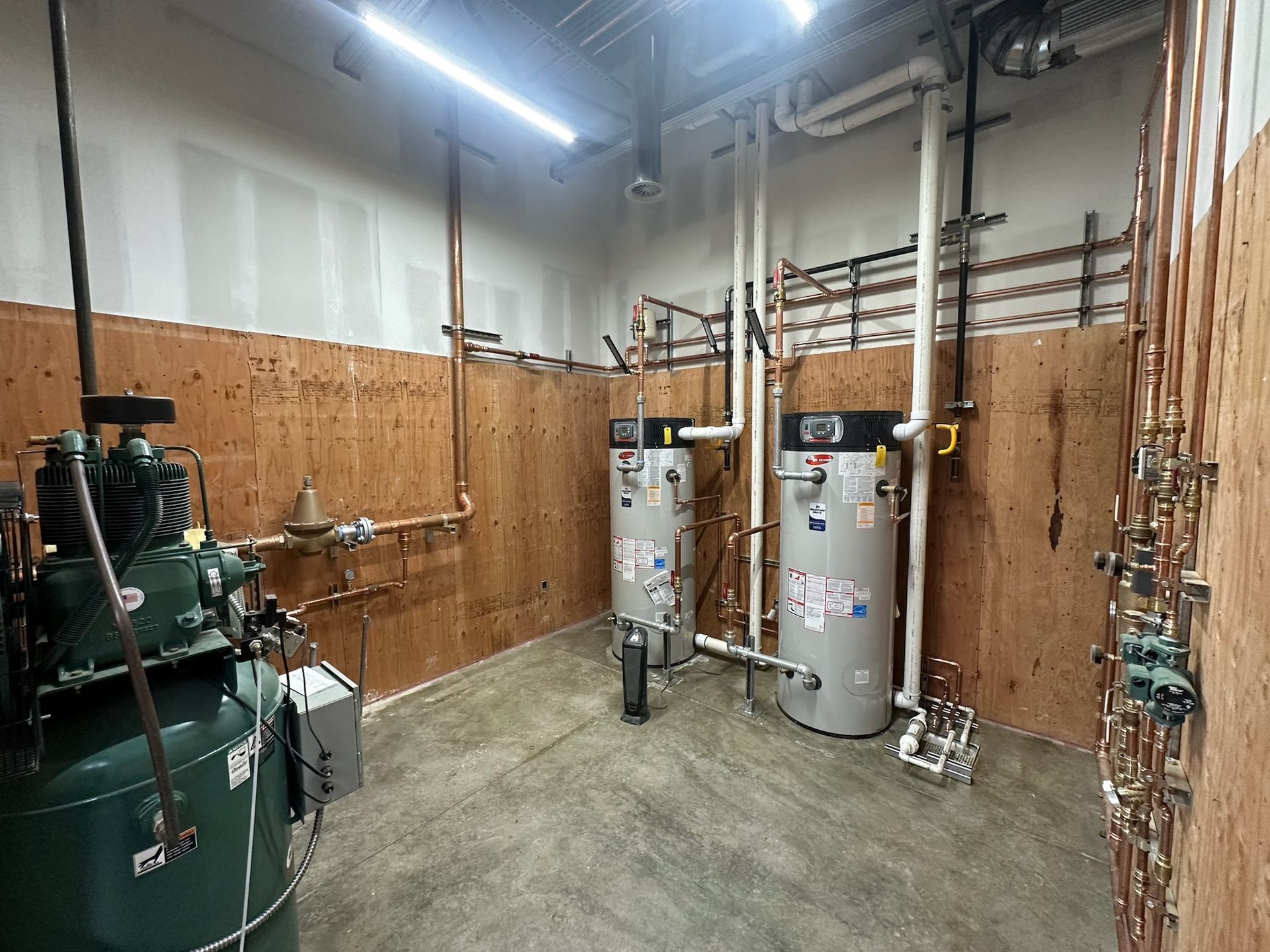 Two water heaters and a pump