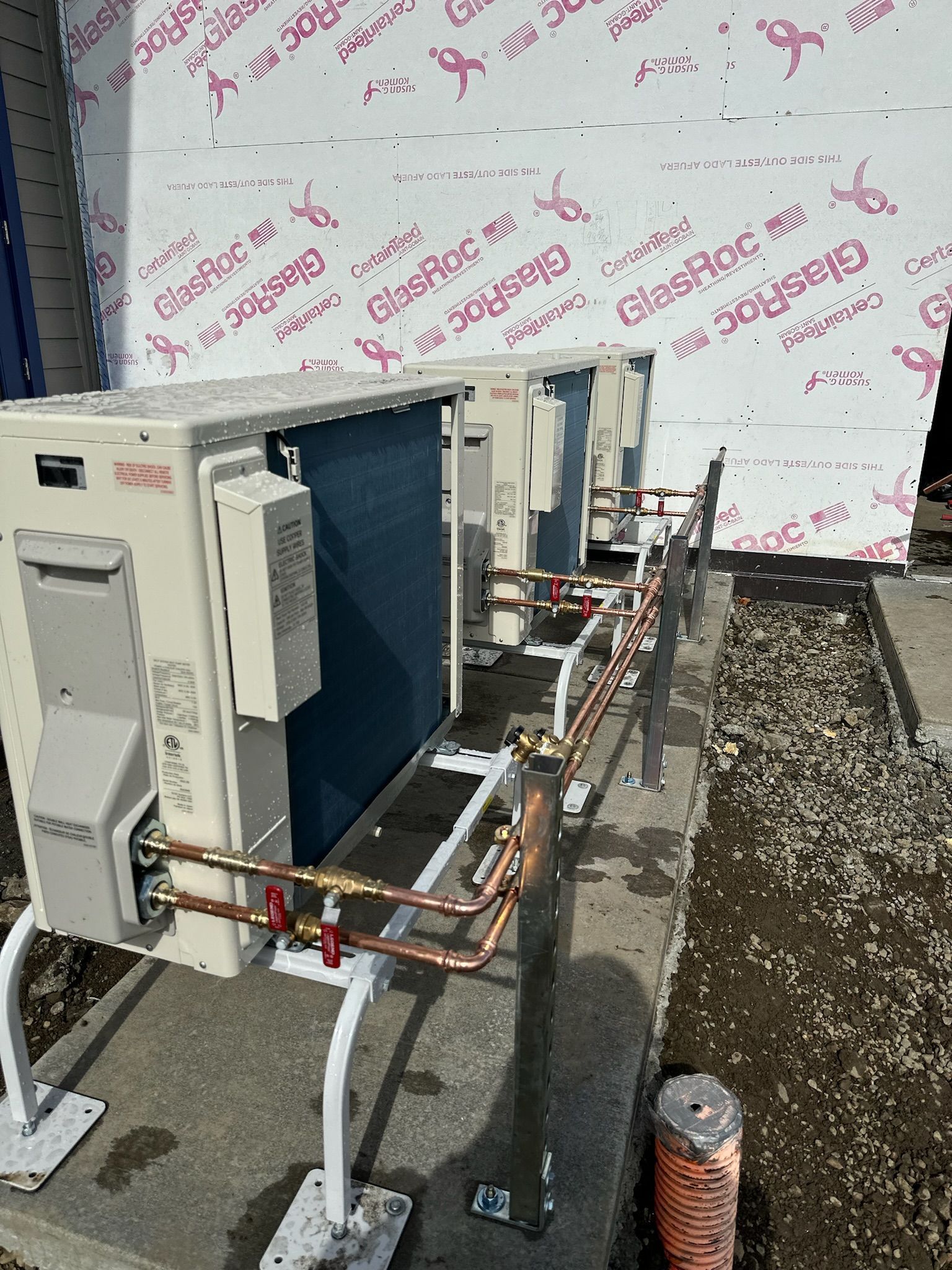 A row of air conditioning units