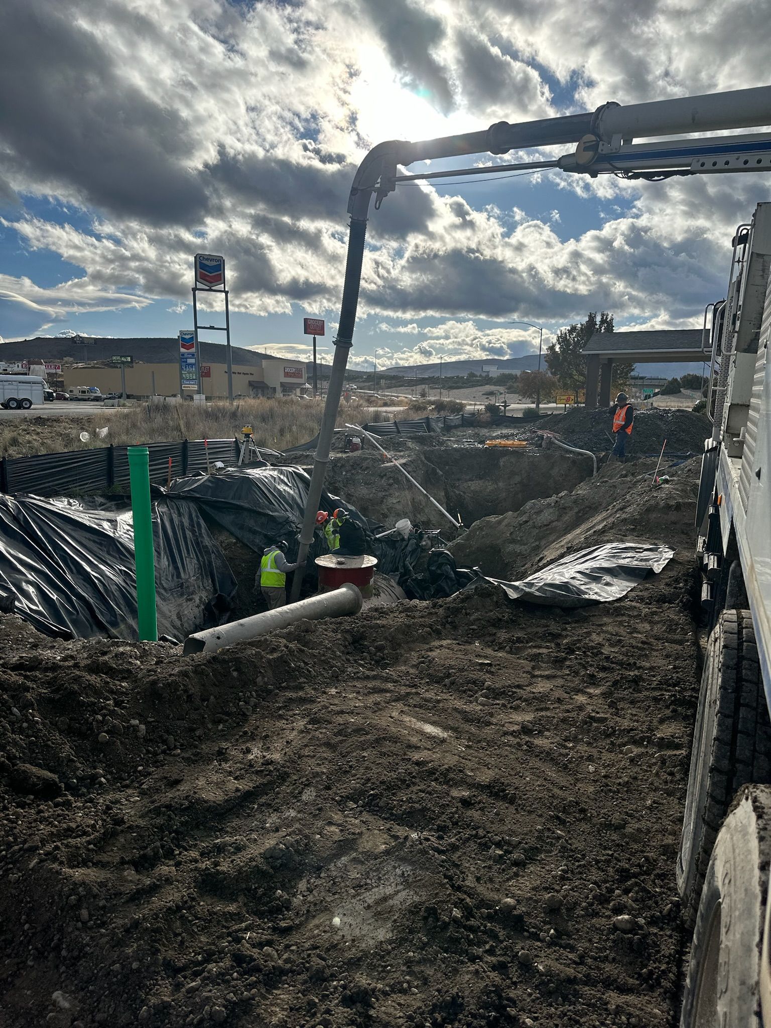 A group of workers are excavating