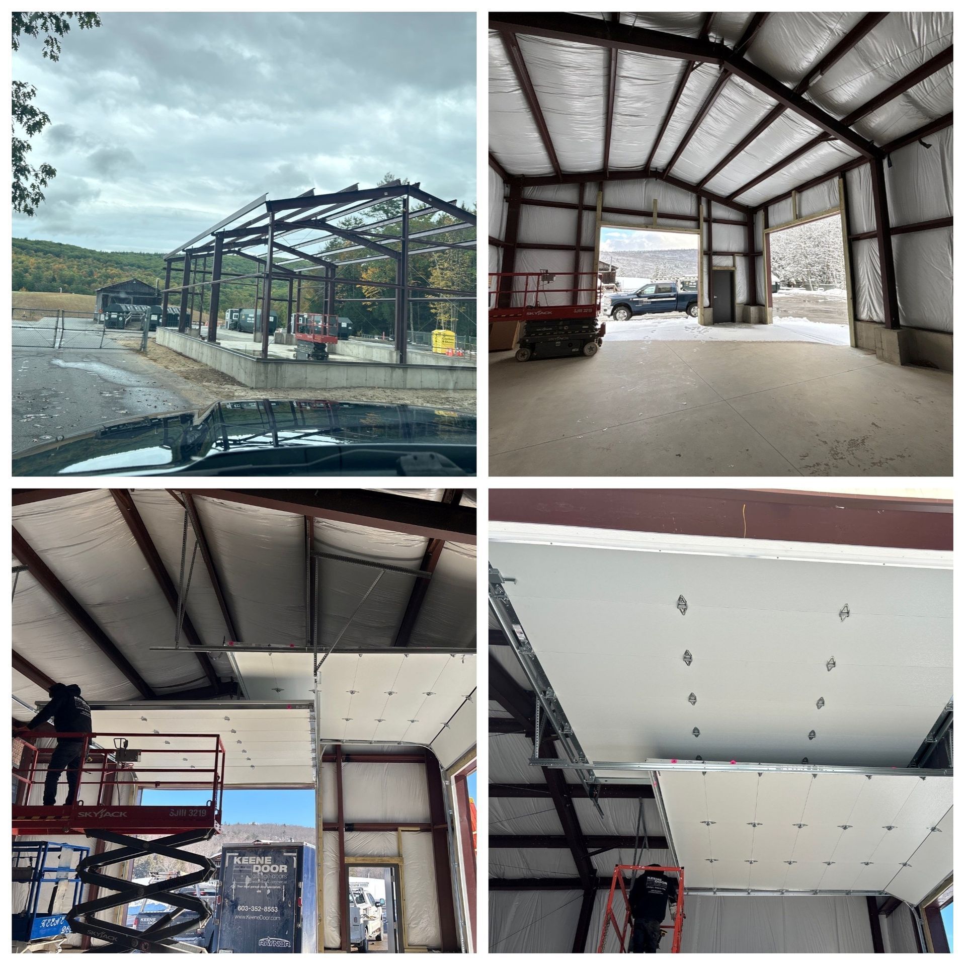 Construction site showing metal roof framing and workers installing interior panels in a garage-like building.