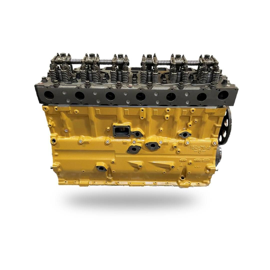 Metal engine cylinder head with multiple valve openings and bolt holes on a light background