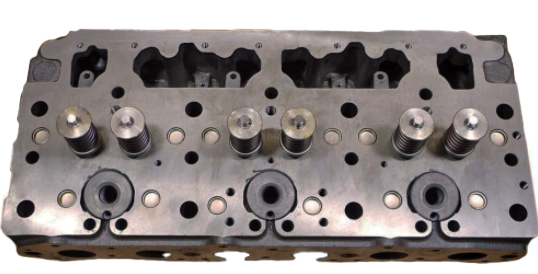 Metal engine cylinder head with multiple valve openings and bolt holes on a light background